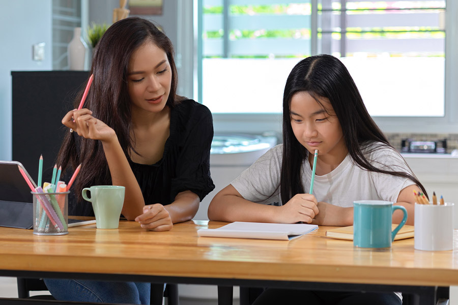 student and tutor together at a desk in Santa Monica